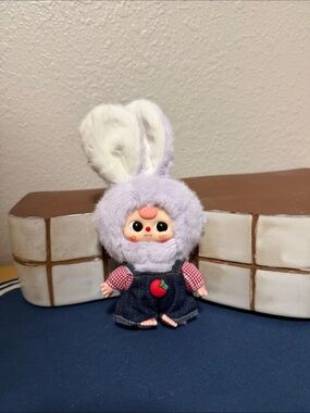 Baby Three 50% keychain Apple overalls with lavender body